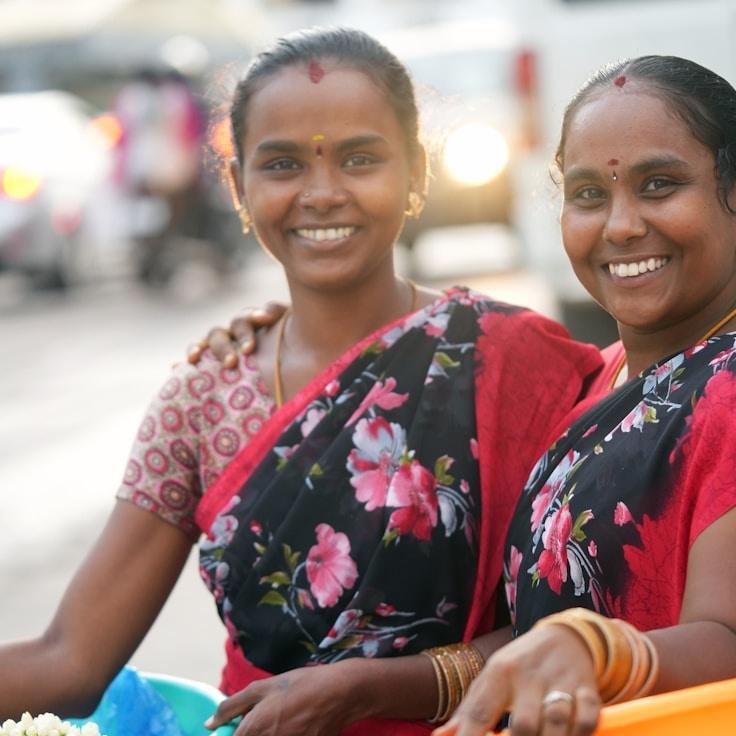 Kaveri Mehta, Lead Design Curator at BreezeFrameValley, reviewing corporate floral arrangements